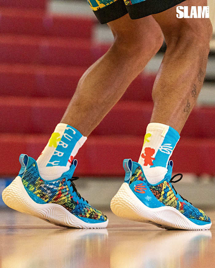 View of blue, yellow, and Curry 10 shoes.